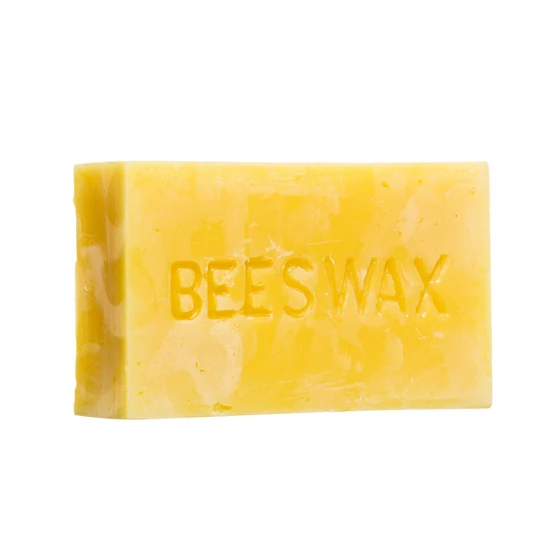 Raw beeswax block melting in a double boiler for DIY skincare projects